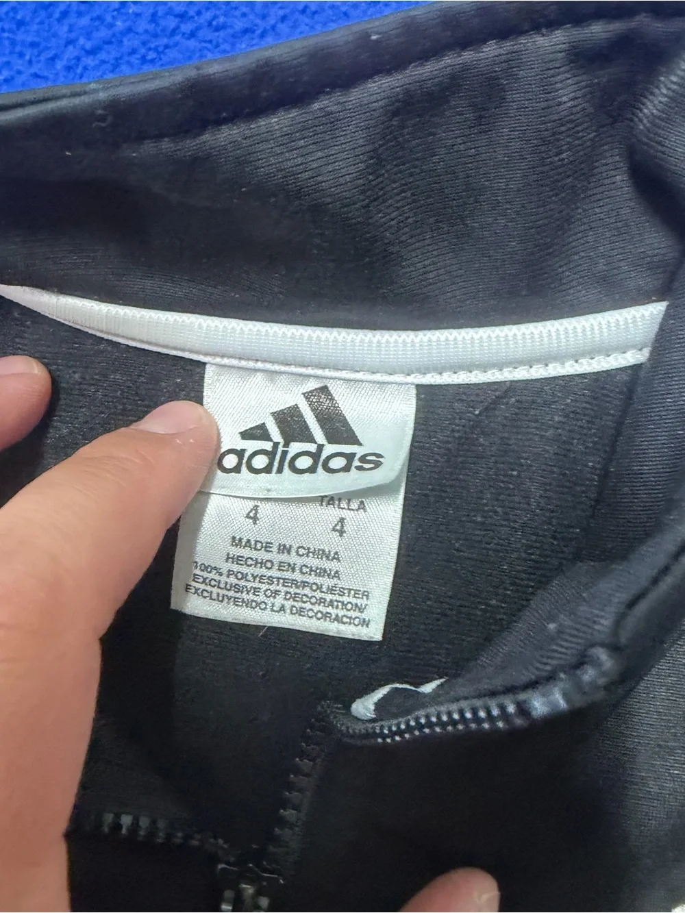 Adidas Black Jacket with White Sleeve Stripes kids 4 has flaws